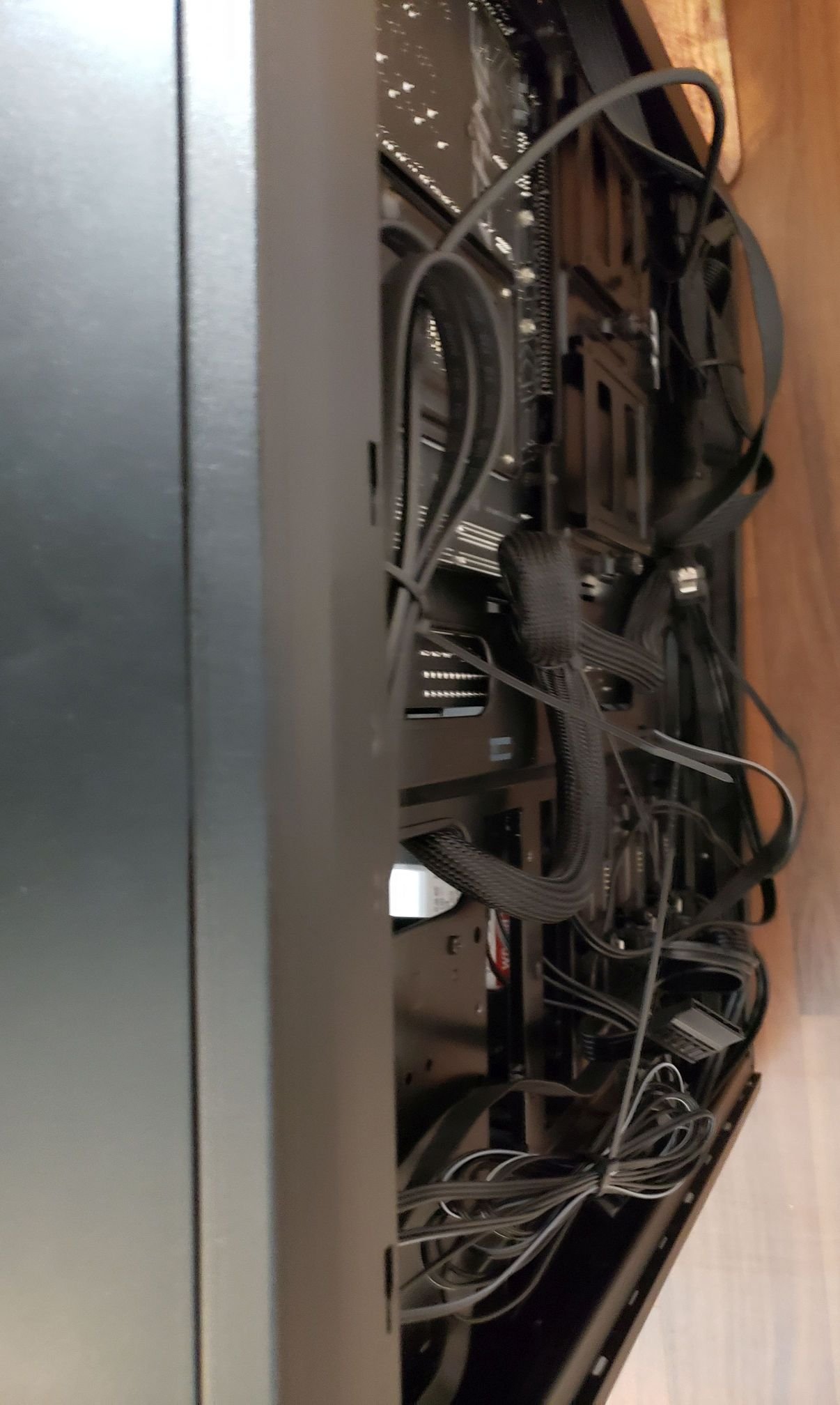 Photo of the rear of the case where all the cables are run